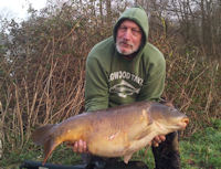 Alan Simmons with a 37 pound mirror carp
